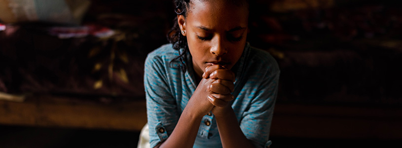 a girl prays