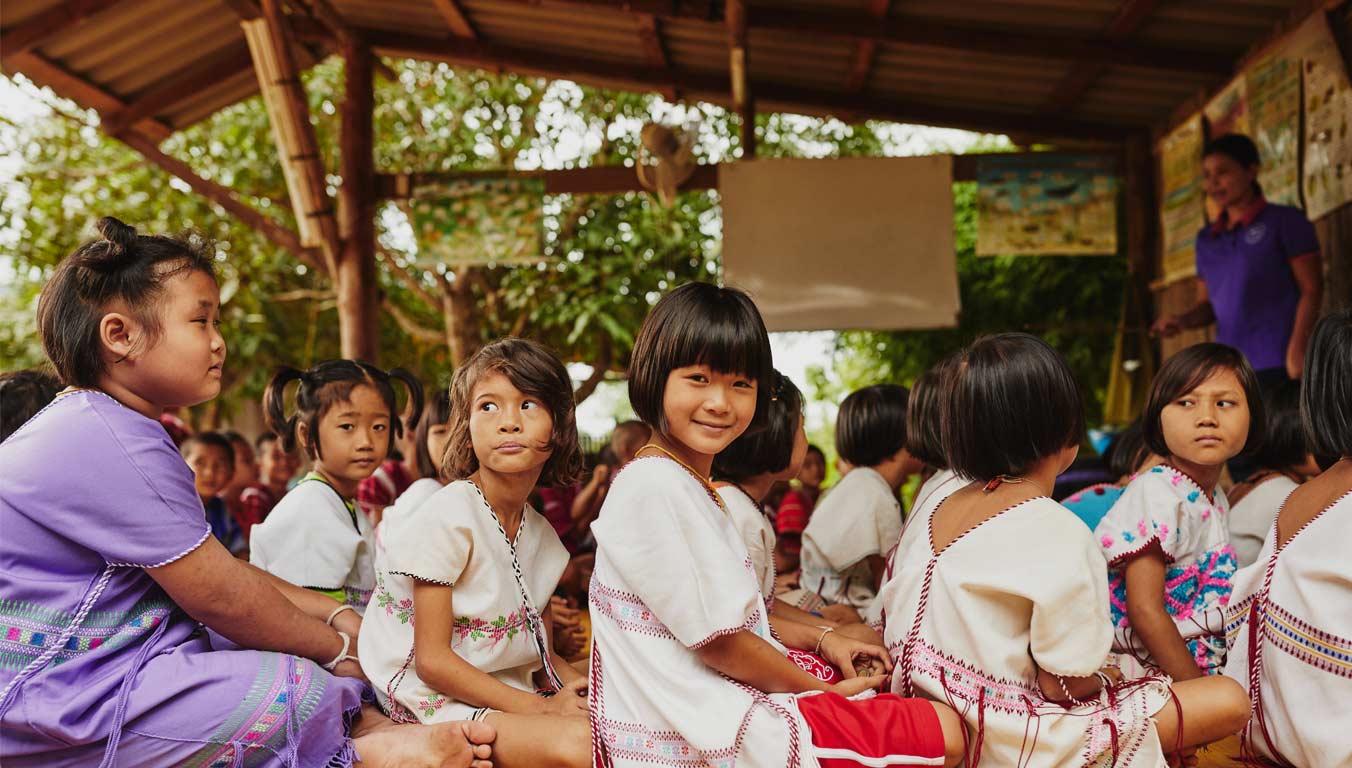 Children sitting together in school in Thailand