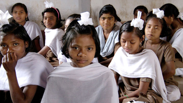 A group of girls from India sitting in their local church