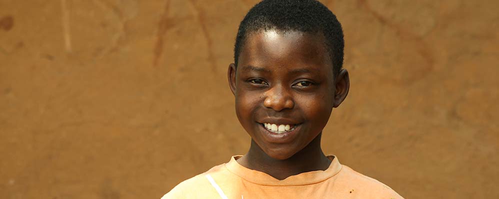 Child in Uganda smiling