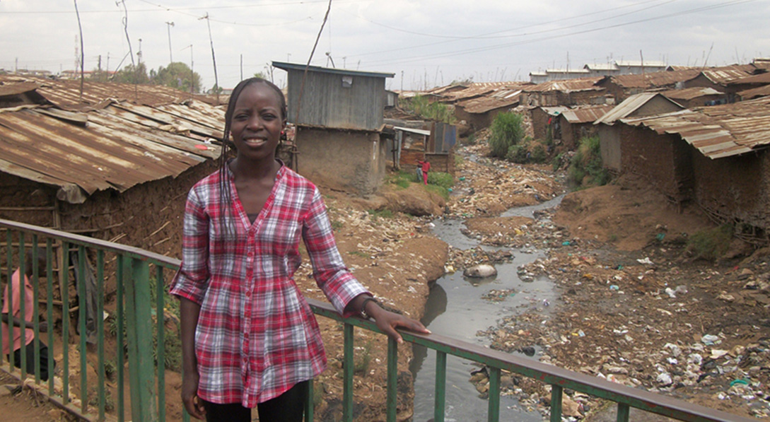 Maureen visiting the Kibera community of Nairobi, Kenya, in 2012.