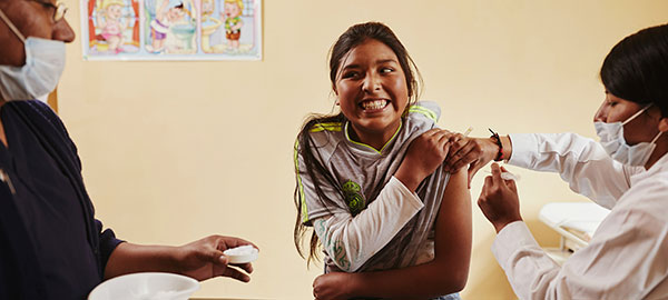 A girl receiving a vaccination