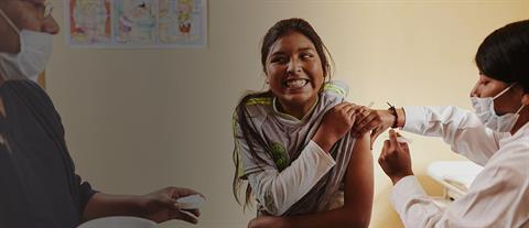 A girl receiving a vaccination