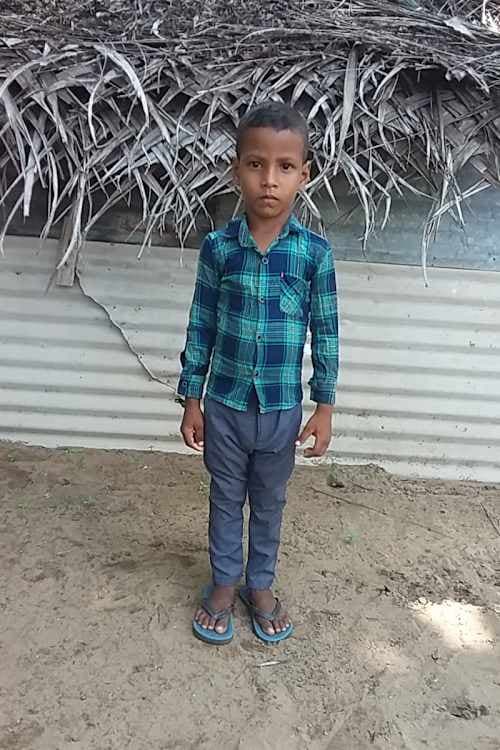 An unsponsored boy named Nitharshan from Sri Lanka who has waited 548 days for a sponsor.