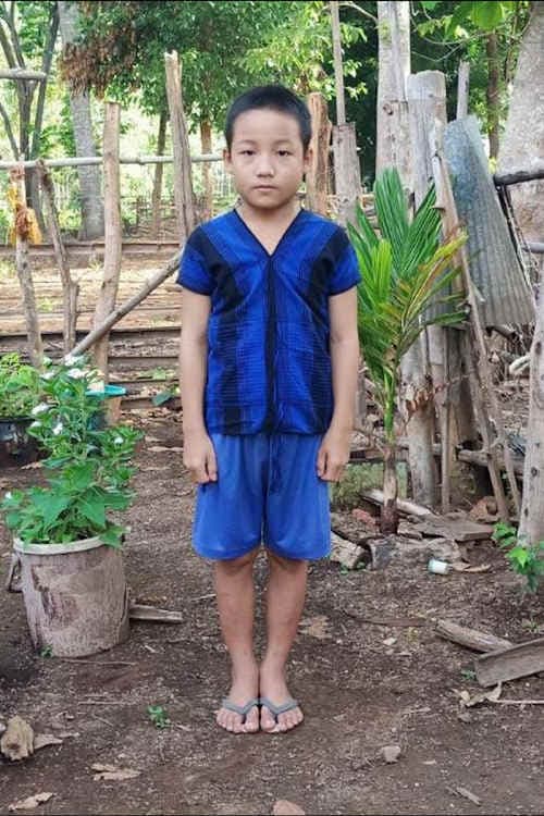 An unsponsored boy named Moolortee from Thailand who has waited 514 days for a sponsor.