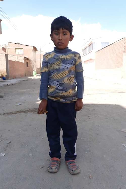 An unsponsored boy named Anghell Jhoel from Bolivia who has waited 493 days for a sponsor.