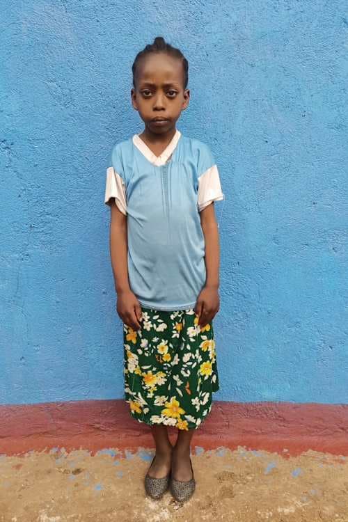 An unsponsored girl named Etenesh from Ethiopia who lives in an AIDS-affected area, is vulnerable to exploitation and has waited 636 days for a sponsor.