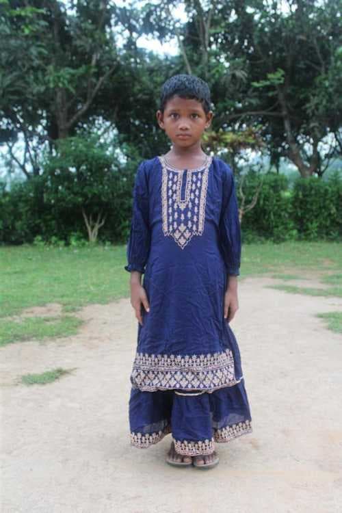 An unsponsored girl named Posbolota from Bangladesh who is vulnerable to exploitation and has waited 501 days for a sponsor.