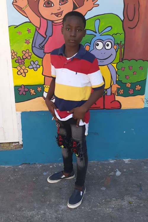 An unsponsored boy named Dolph from Haiti who is vulnerable to exploitation and has waited 553 days for a sponsor.
