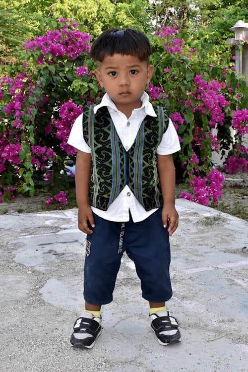 An unsponsored boy named Gilang from Indonesia who has waited 545 days for a sponsor.