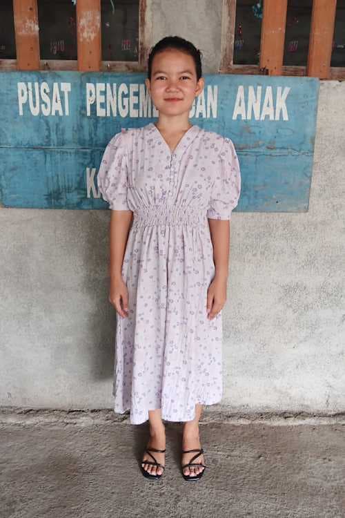 An unsponsored girl named Jien from Indonesia who has waited 370 days for a sponsor.