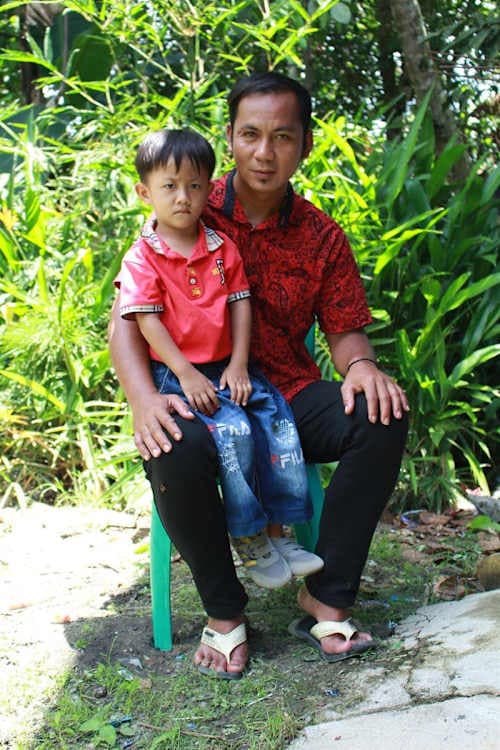 An unsponsored boy named Egi from Indonesia who has waited 547 days for a sponsor.