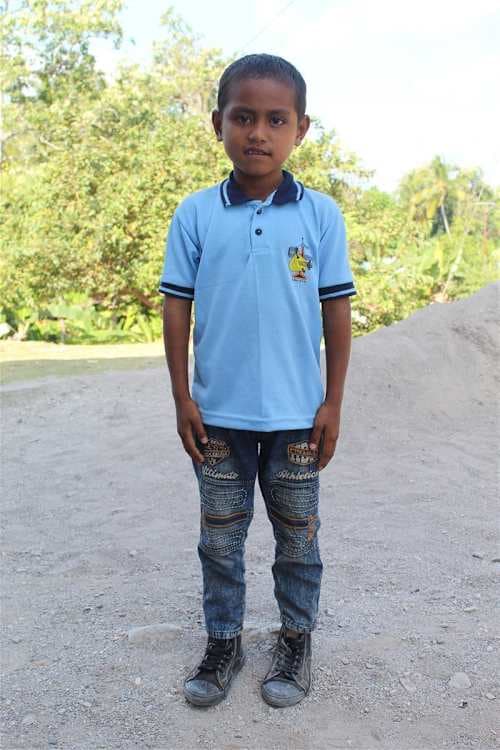 An unsponsored boy named Mitro from Indonesia who has waited 550 days for a sponsor.