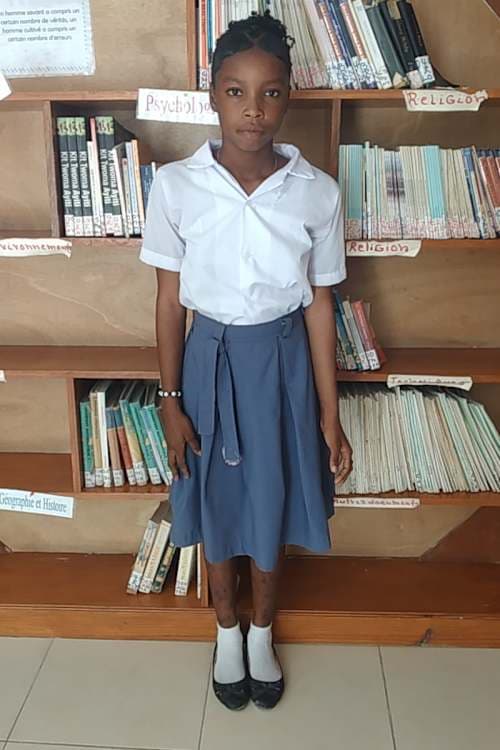 An unsponsored girl named Marie from Haiti who is vulnerable to exploitation and has waited 707 days for a sponsor.