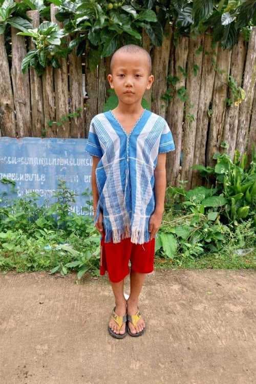 An unsponsored boy named Danai from Thailand who has waited 521 days for a sponsor.