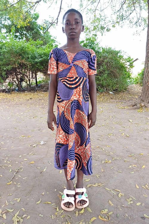An unsponsored girl named Bene from Togo who lives in an AIDS-affected area, is vulnerable to exploitation and has waited 617 days for a sponsor.