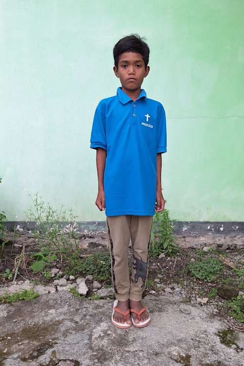 An unsponsored boy named Deo from Indonesia who has waited 624 days for a sponsor.