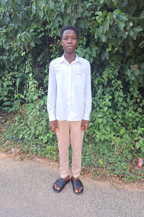 An unsponsored boy named Enoch from Ghana who lives in an AIDS-affected area and has waited 245 days for a sponsor.