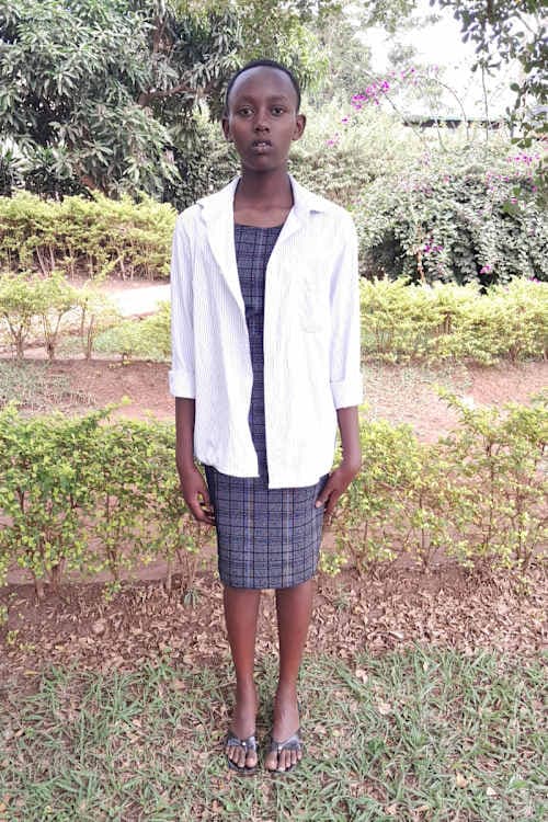 An unsponsored girl named Kevine from Rwanda who lives in an AIDS-affected area, is vulnerable to exploitation and has waited  days for a sponsor.