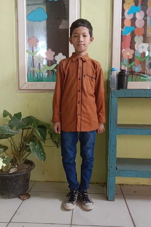 An unsponsored boy named Matheo from Indonesia who has waited 505 days for a sponsor.