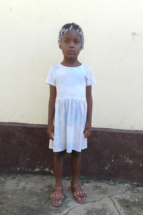 An unsponsored girl named Chrislene from Haiti who is vulnerable to exploitation and has waited 518 days for a sponsor.