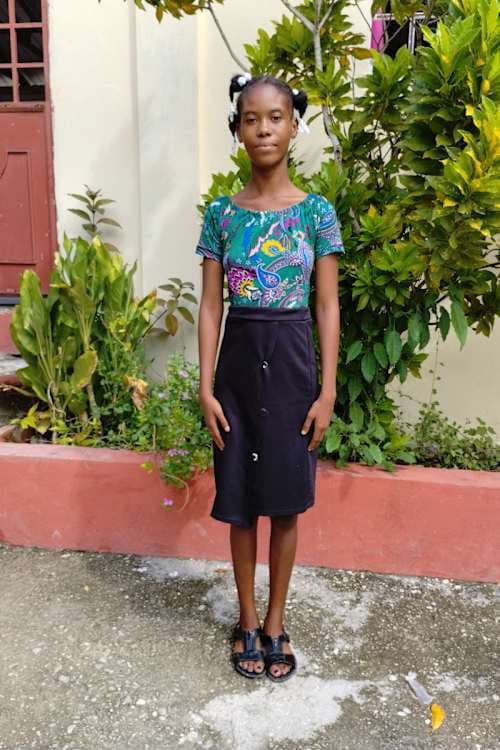 An unsponsored girl named Judette from Haiti who is vulnerable to exploitation and has waited 432 days for a sponsor.