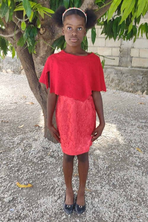 An unsponsored girl named Sam from Haiti who is vulnerable to exploitation and has waited 940 days for a sponsor.