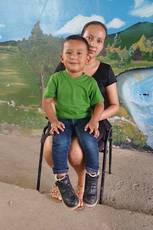 An unsponsored boy named Carlos from Honduras who has waited 473 days for a sponsor.