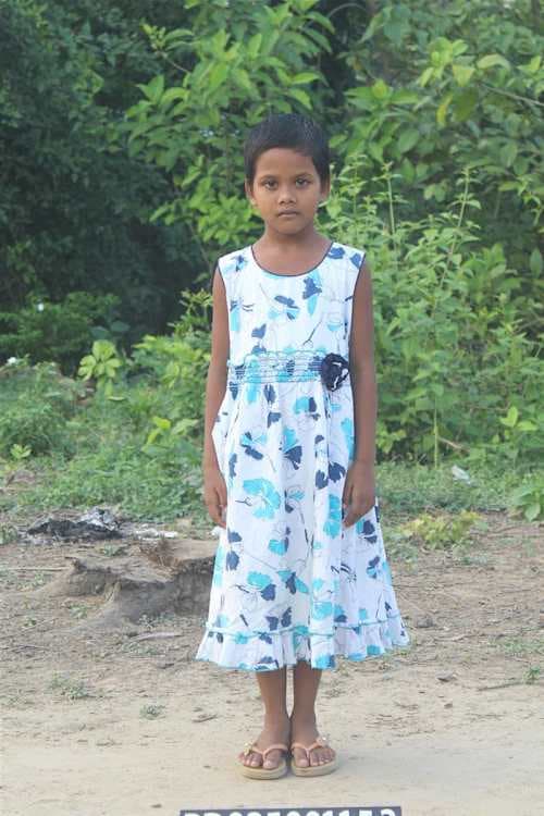 An unsponsored girl named Murmu from Bangladesh who is vulnerable to exploitation and has waited 518 days for a sponsor.