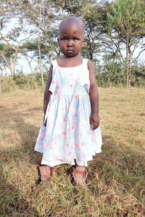 An unsponsored girl named Swinny from Kenya who lives in an AIDS-affected area and has waited 470 days for a sponsor.
