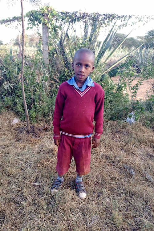 An unsponsored boy named Mutua from Kenya who lives in an AIDS-affected area and has waited 495 days for a sponsor.