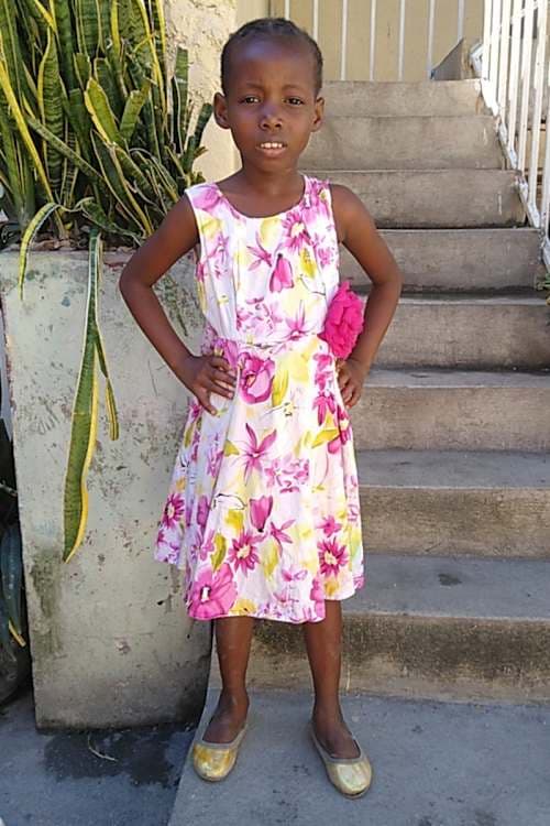 An unsponsored girl named Esther from Haiti who is vulnerable to exploitation and has waited 585 days for a sponsor.