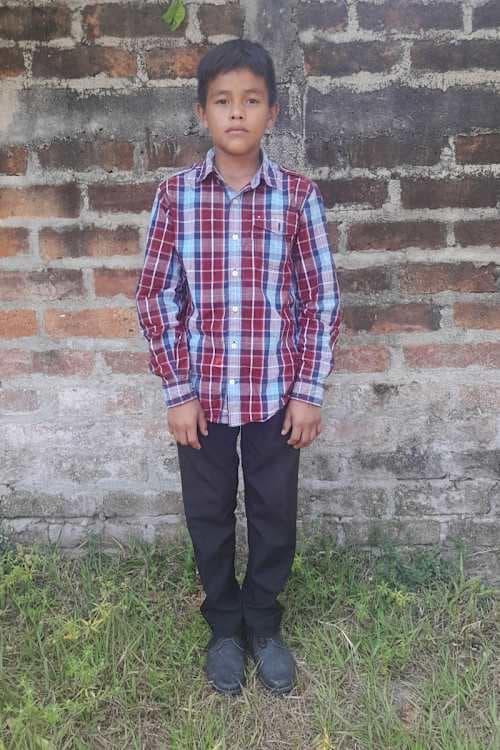 An unsponsored boy named Eli from El Salvador who has waited 523 days for a sponsor.