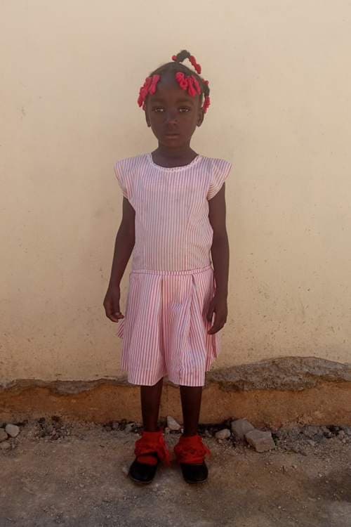 An unsponsored girl named Lunie from Haiti who is vulnerable to exploitation and has waited 473 days for a sponsor.