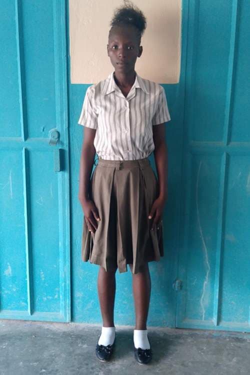 An unsponsored girl named Rose-Merline from Haiti who is vulnerable to exploitation and has waited 550 days for a sponsor.