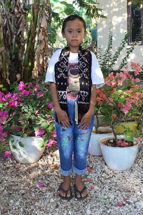 An unsponsored girl named Putri from Indonesia who has waited 511 days for a sponsor.