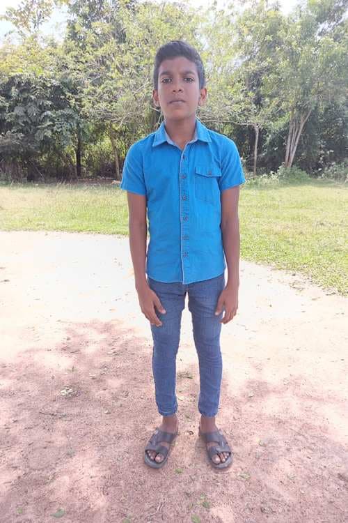 An unsponsored boy named Mithun from Sri Lanka who has waited 551 days for a sponsor.