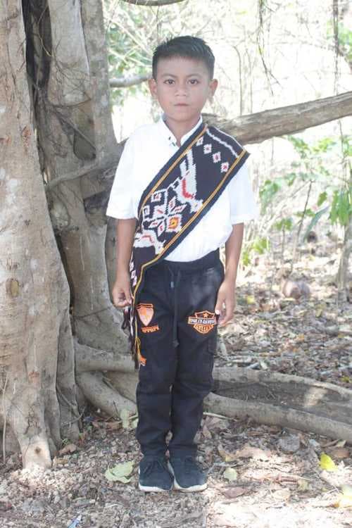 An unsponsored boy named Marlon from Indonesia who has waited 430 days for a sponsor.