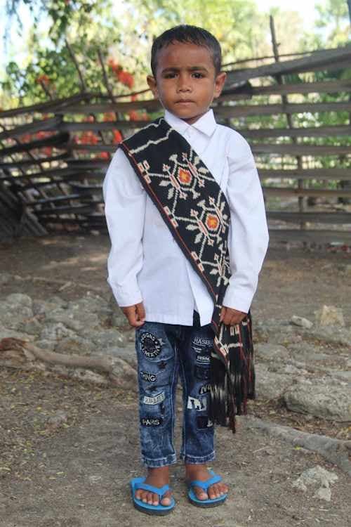 An unsponsored boy named Putra from Indonesia who has waited 508 days for a sponsor.