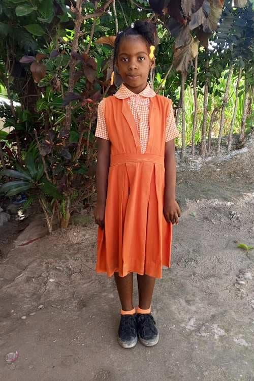 An unsponsored girl named Daphne from Haiti who is vulnerable to exploitation and has waited 496 days for a sponsor.