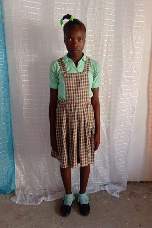 An unsponsored girl named Joana from Haiti who is vulnerable to exploitation and has waited 365 days for a sponsor.