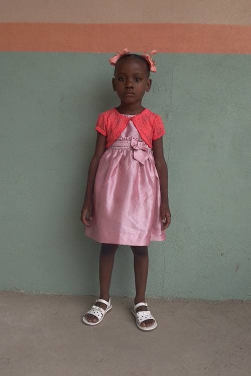An unsponsored girl named Christ from Haiti who is vulnerable to exploitation and has waited 428 days for a sponsor.
