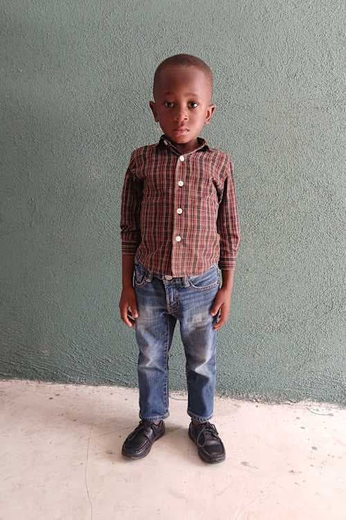 An unsponsored boy named Saint from Haiti who is vulnerable to exploitation and has waited 432 days for a sponsor.