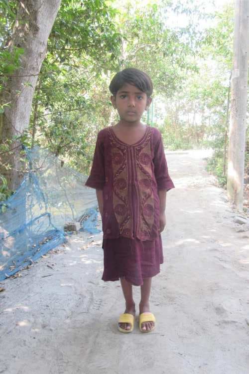 An unsponsored girl named Mouli from Bangladesh who is vulnerable to exploitation and has waited 429 days for a sponsor.
