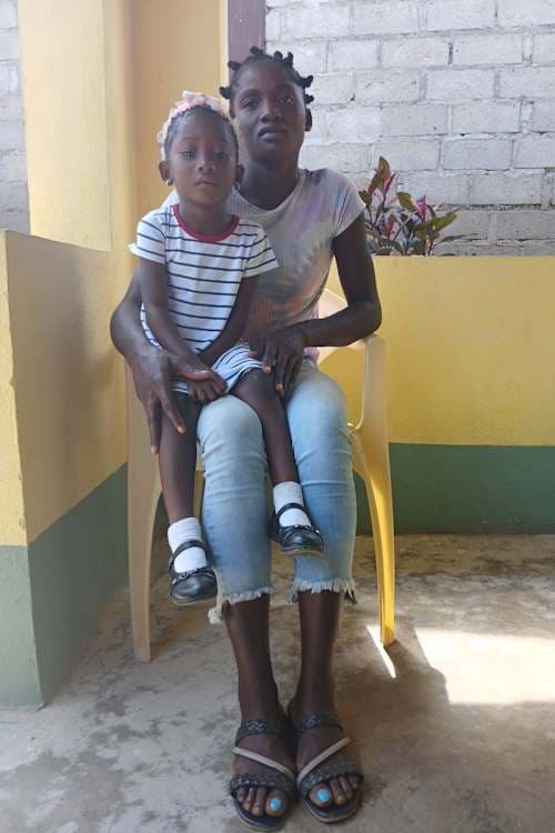 An unsponsored girl named Djenaika from Haiti who is vulnerable to exploitation and has waited 423 days for a sponsor.