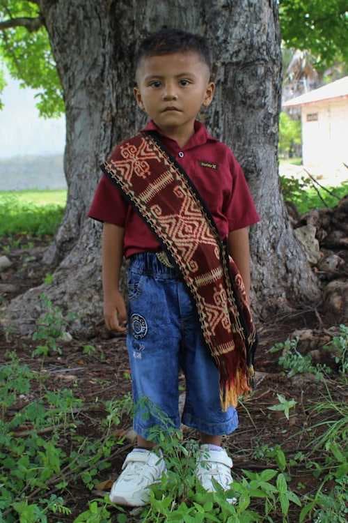 An unsponsored boy named Eleazer from Indonesia who has waited 425 days for a sponsor.