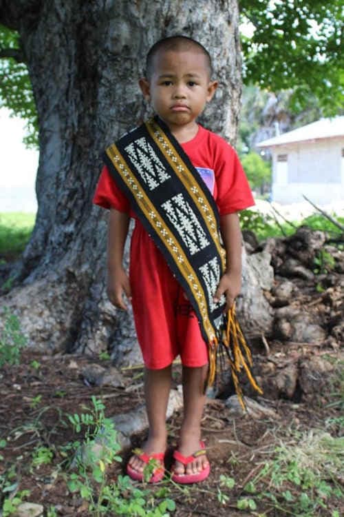 An unsponsored boy named Kenzo from Indonesia who has waited 424 days for a sponsor.