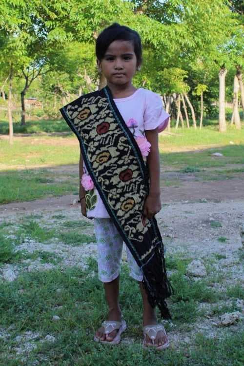 An unsponsored girl named Agnes from Indonesia who has waited 425 days for a sponsor.
