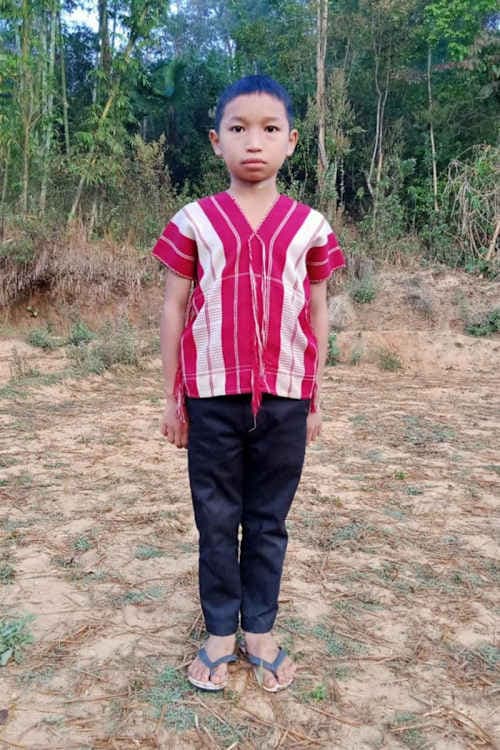 An unsponsored boy named Saw Wah Wah from Thailand who has waited 550 days for a sponsor.
