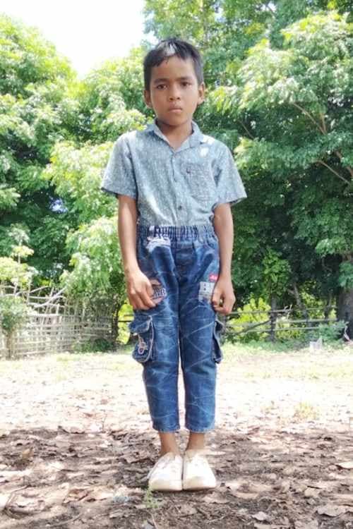 An unsponsored boy named Rido from Indonesia who has waited 507 days for a sponsor.